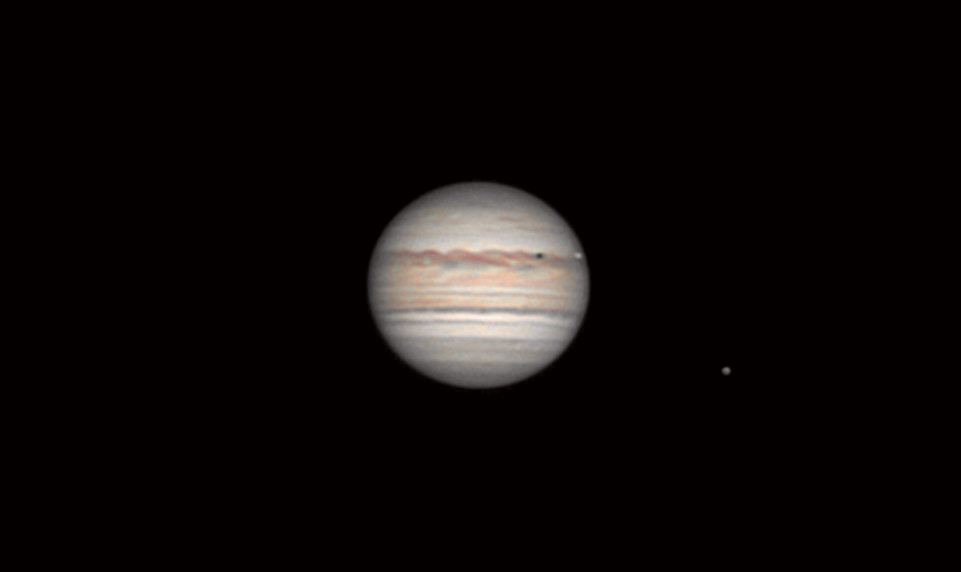 Přechod Io přes disk Jupitera